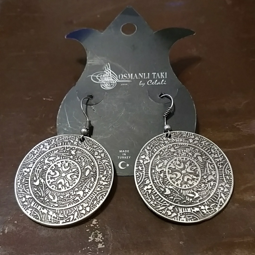 Silver medallion dangle earrings
